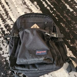 Black Jansport Backpack fits books/Folders and homework or Ipad